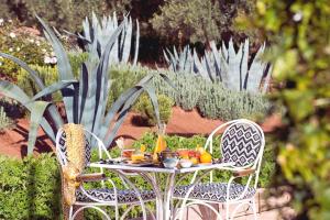 Jardin de l'établissement The Source Hotel Music & Spa
