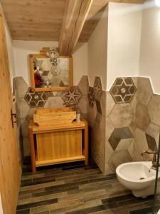 A bathroom at Delfin Dal Pianhol