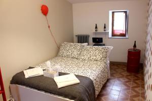 Postel nebo postele na pokoji v ubytování La Sosta Navarra Bed & Beer
