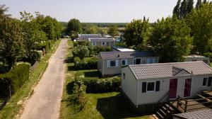 an aerial view of a row of mobile homes at Camping Loisirs Des Groux in Mousseaux-sur-Seine