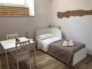 Postel nebo postele na pokoji v ubytování Arco dolce Arco