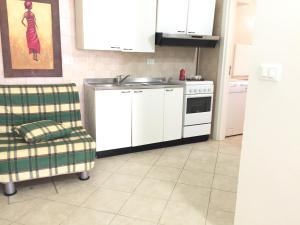 A kitchen or kitchenette at Casa Vacanza Zia Dani