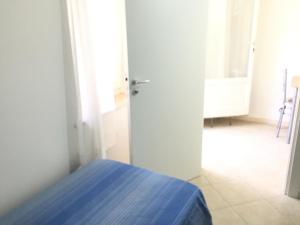 A bed or beds in a room at Casa Vacanza Zia Dani