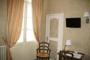 TV a/nebo společenská místnost v ubytování Hotel Montsegur