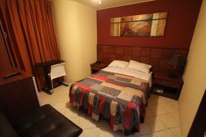 Postel nebo postele na pokoji v ubytování Hotel Chicama