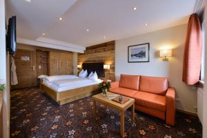 Postel nebo postele na pokoji v ubytování Hotel Randsbergerhof