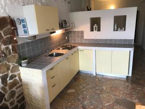 Kuchyňa alebo kuchynka v ubytovaní Ivančica Apartments