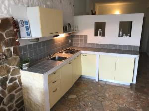 Kuchyňa alebo kuchynka v ubytovaní Ivančica Apartments