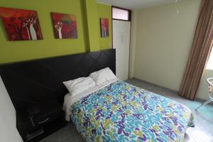 Postel nebo postele na pokoji v ubytování Hotel Chicama