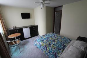 Postel nebo postele na pokoji v ubytování Hotel Chicama