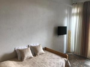 Televízia a/alebo spoločenská miestnosť v ubytovaní Ivančica Apartments