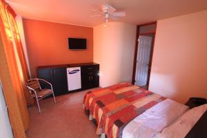Postel nebo postele na pokoji v ubytování Hotel Chicama