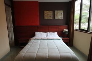 Postel nebo postele na pokoji v ubytování Hotel Chicama