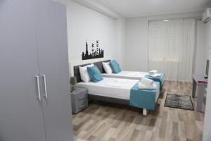 Postel nebo postele na pokoji v ubytování Hotel New York