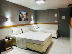 Cama ou camas em um quarto em Inter Hotel