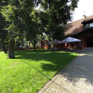 Vonkajšia záhrada v ubytovaní Hotel Belfer