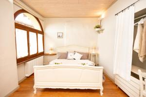 Posteľ alebo postele v izbe v ubytovaní b&b Balcone del Biellese