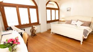 Posteľ alebo postele v izbe v ubytovaní b&b Balcone del Biellese