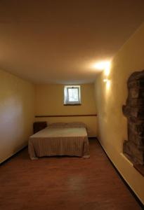 Postel nebo postele na pokoji v ubytování Agriturismo Giumin + 12 fotografií