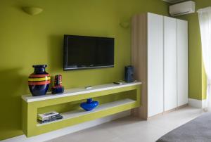TV a/nebo společenská místnost v ubytování B&b Don Giovanni
