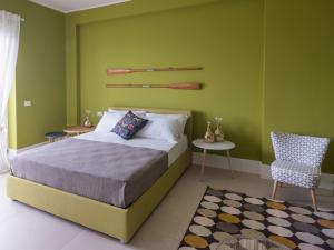 Postel nebo postele na pokoji v ubytování B&b Don Giovanni