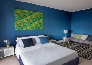 Postel nebo postele na pokoji v ubytování B&b Don Giovanni