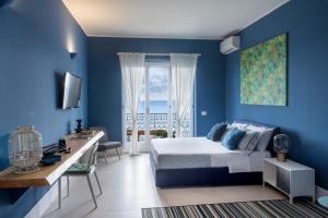 Postel nebo postele na pokoji v ubytování B&b Don Giovanni