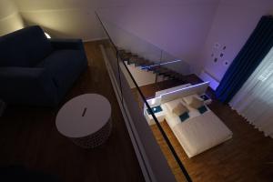 Postel nebo postele na pokoji v ubytování B&B BORGO FORNACI