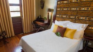 Letto o letti in una camera di Hotel l'Impératrice