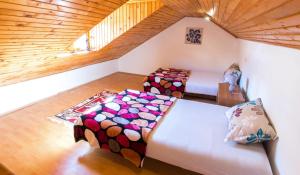 Ένα ή περισσότερα κρεβάτια σε δωμάτιο στο Apartment Tiger Lily