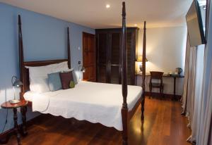 Letto o letti in una camera di Hotel l'Impératrice