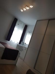Posteľ alebo postele v izbe v ubytovaní Apartments Petričević