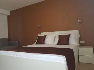 Posteľ alebo postele v izbe v ubytovaní Apartments Petričević