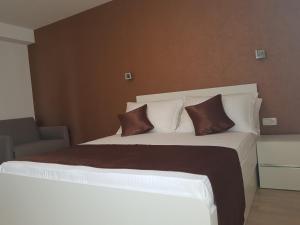 Posteľ alebo postele v izbe v ubytovaní Apartments Petričević
