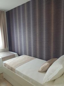 Posteľ alebo postele v izbe v ubytovaní Apartments Petričević