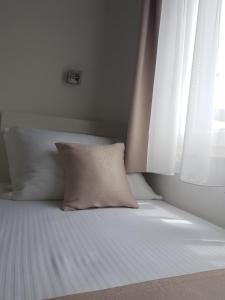Posteľ alebo postele v izbe v ubytovaní Apartments Petričević