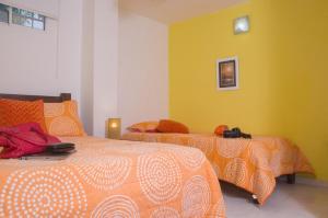 Postel nebo postele na pokoji v ubytování Hotel Marovi