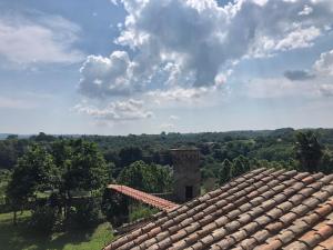 a roof of a house with a view of the countryside at Casa Vacanze La Torretta in Sutri