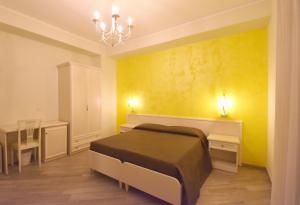 A bed or beds in a room at B&B Vista Santuario