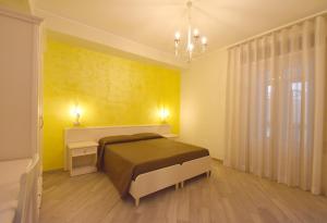 A bed or beds in a room at B&B Vista Santuario