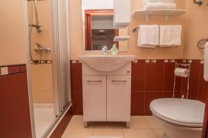 Phòng tắm tại Apartments Mila +59 ảnh