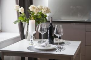 Nápoje v ubytovaní Apartament 51 z miejscem parkingowym