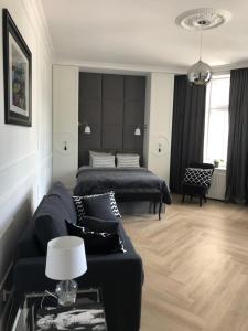 Posteľ alebo postele v izbe v ubytovaní Apartament 51 z miejscem parkingowym