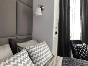 Posteľ alebo postele v izbe v ubytovaní Apartament 51 z miejscem parkingowym
