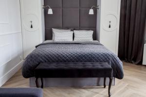 Posteľ alebo postele v izbe v ubytovaní Apartament 51 z miejscem parkingowym