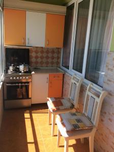 Kuchyň nebo kuchyňský kout v ubytování Apartment Sea View