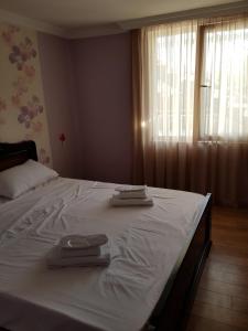 Giường trong phòng chung tại White House in Kakheti Eniseli