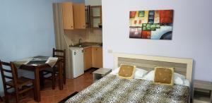 Ein Bett oder Betten in einem Zimmer der Unterkunft Berti Apartment