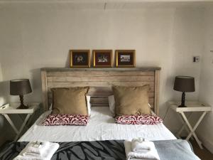 Postel nebo postele na pokoji v ubytování Carneddie Cottage - main