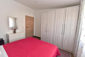 Postel nebo postele na pokoji v ubytování Apartment Roko